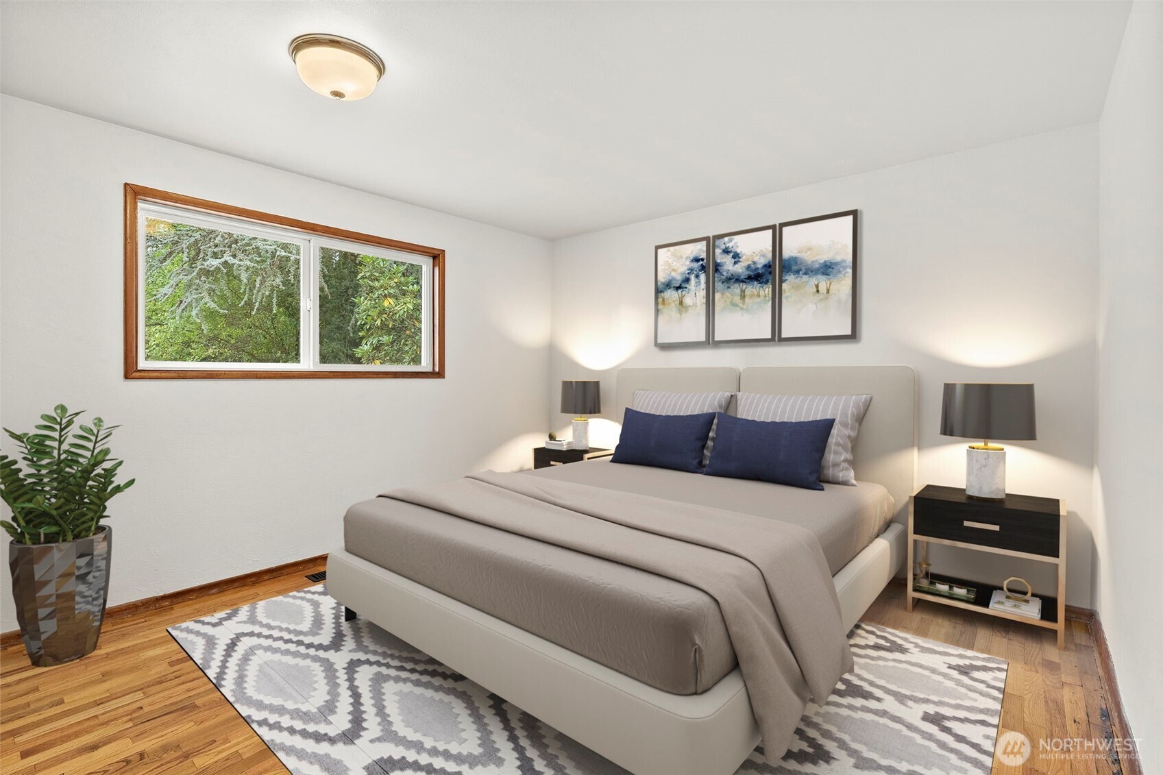 4606 15th Avenue Northeast Olympia, WA 98516 - Photo 11 of 17 a bedroom with a bed and a window