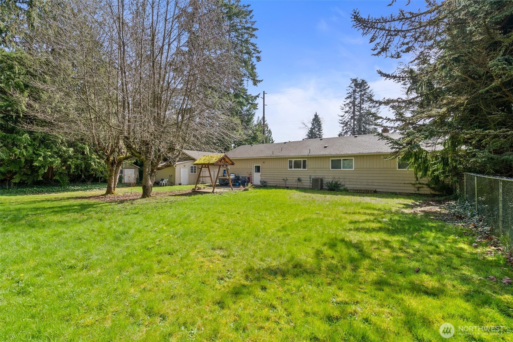 4606 15th Avenue Northeast Olympia, WA 98516 - Photo 13 of 17 a front view of a house with garden