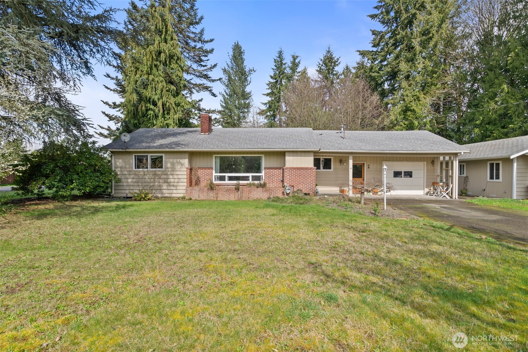 4606 15th Avenue Northeast Olympia, WA 98516 - Photo 2 of 17 front view of a house with a yard