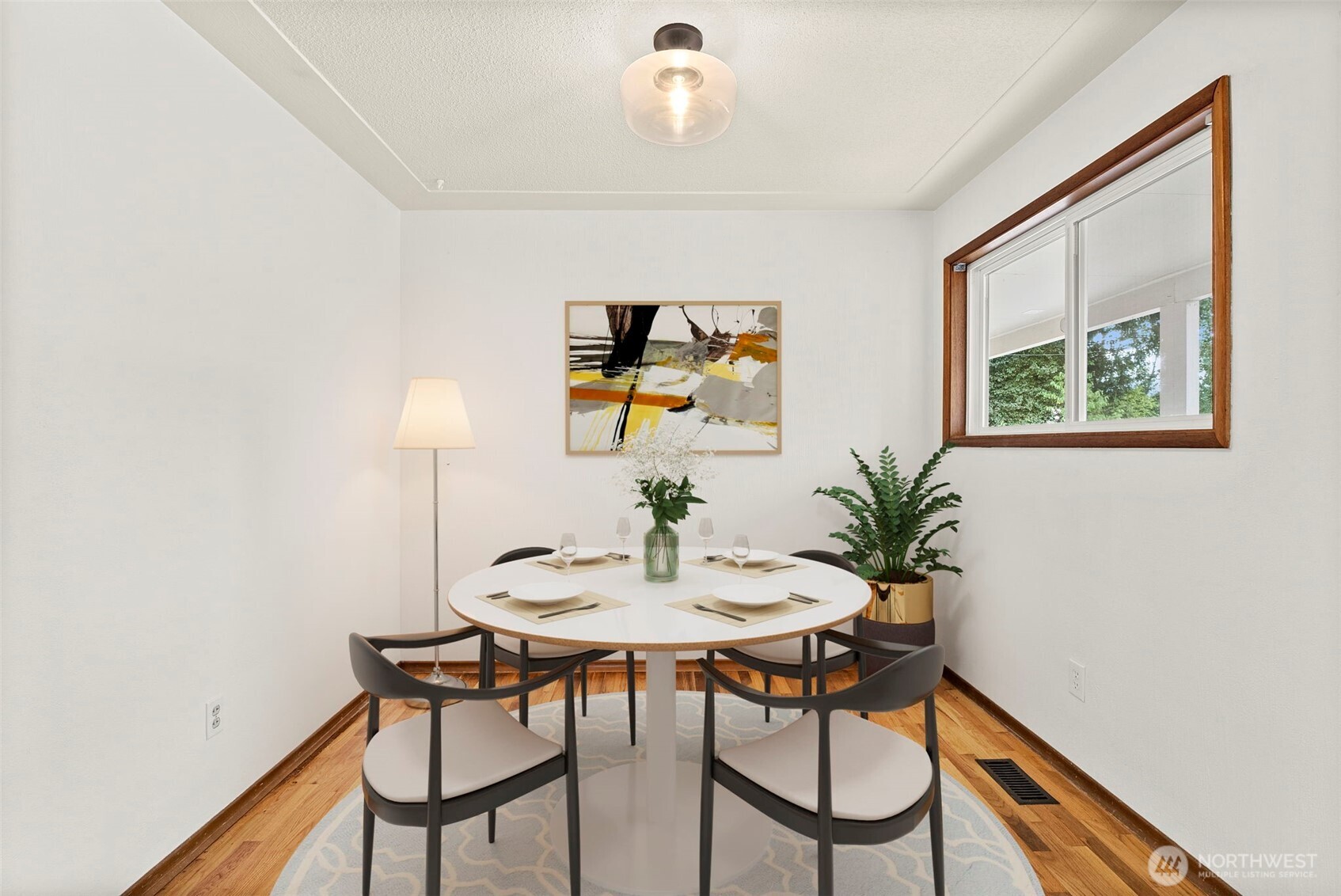 4606 15th Avenue Northeast Olympia, WA 98516 - Photo 6 of 17 a view of a dining room with furniture and window