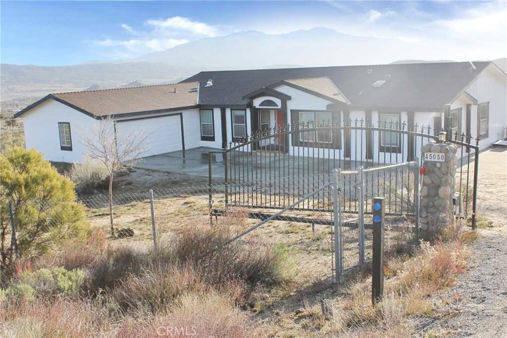 45050 Chapman Road Anza, CA 92539 - Photo 1 of 1 a front view of a house with a yard