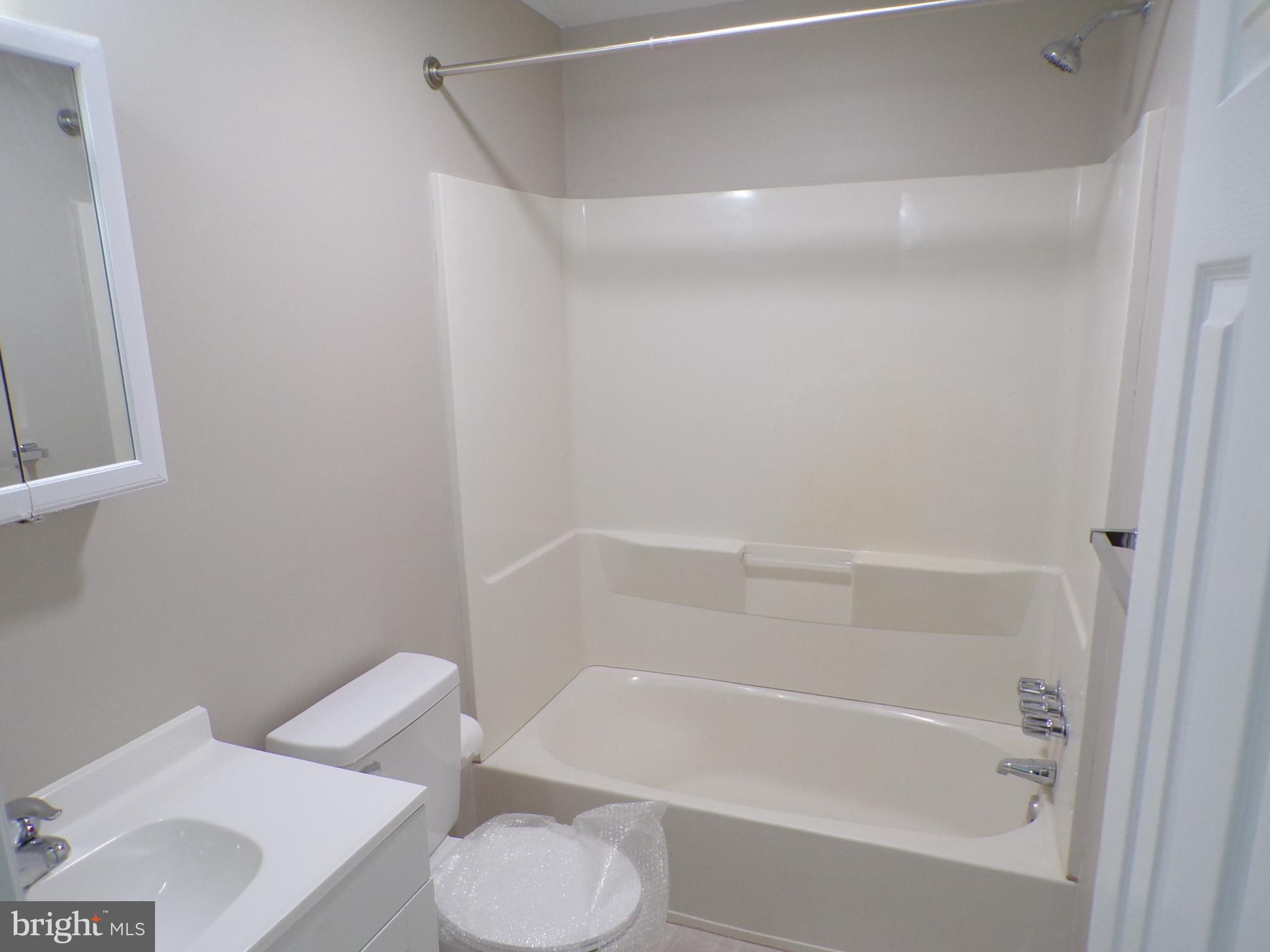 2452 Hopewell Road, Unit B Marlton, NJ 08053 - Photo 10 of 15 a bathroom with a toilet and a bathtub