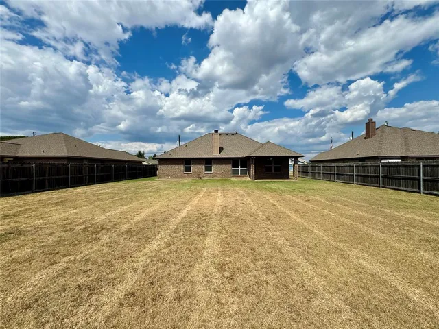 a front view of house with yard