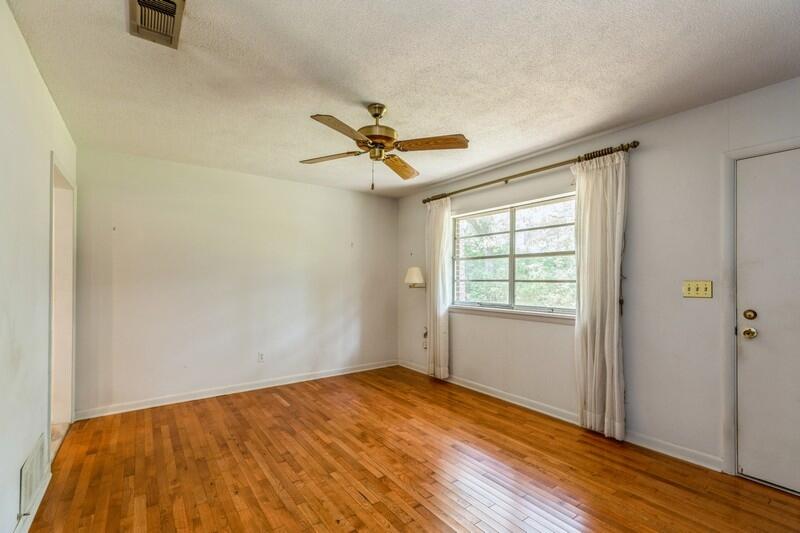 349 Powell Drive Crestview, FL 32536 - Photo 17 of 30 wooden floor in an empty room with a window