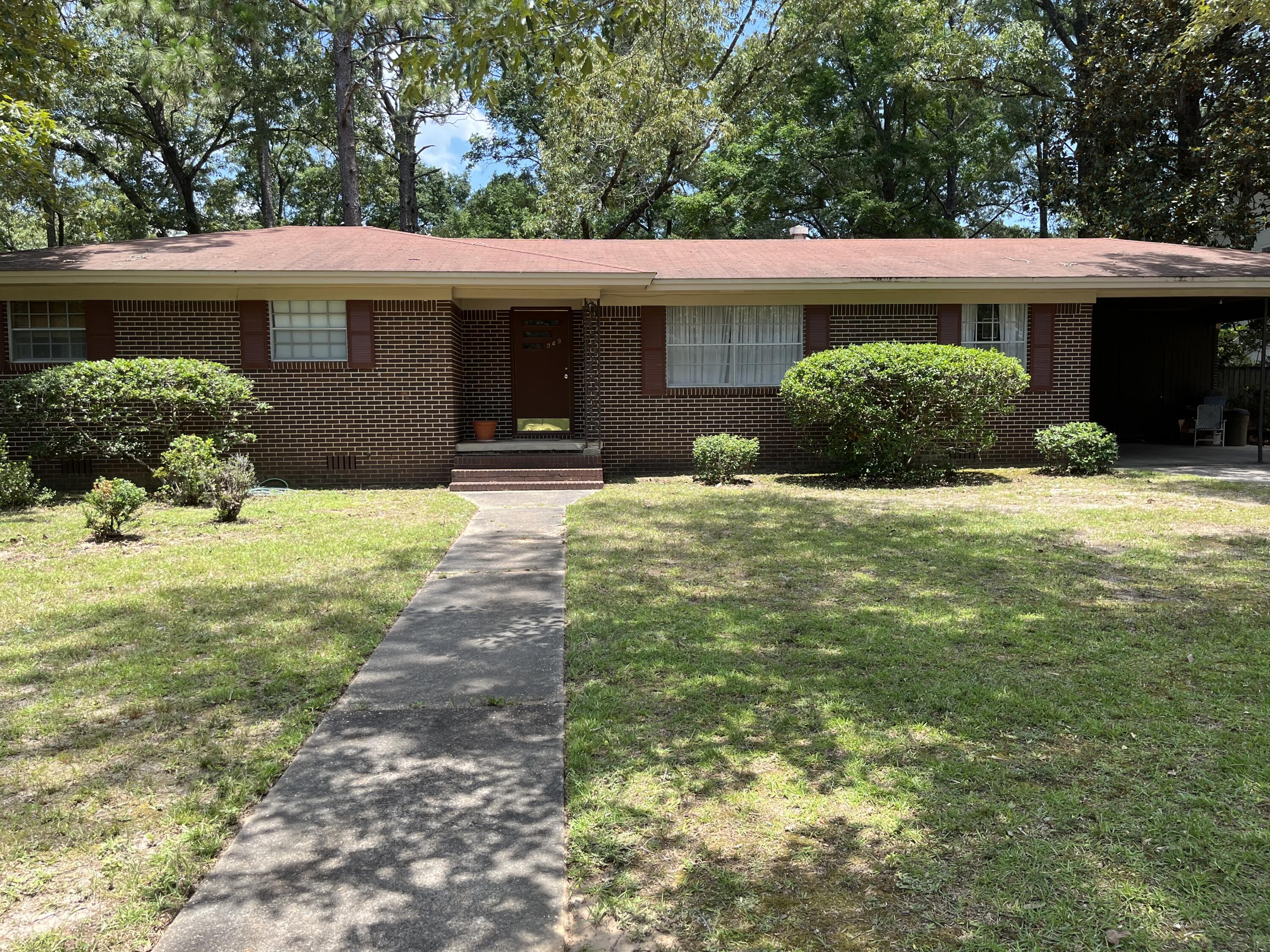 349 Powell Drive Crestview, FL 32536 - Photo 2 of 30 a view of a house with a yard