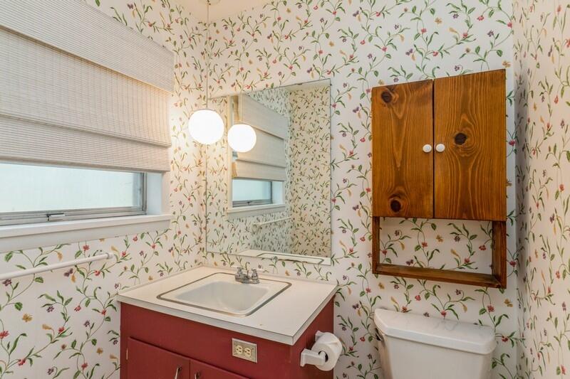 349 Powell Drive Crestview, FL 32536 - Photo 24 of 30 a bathroom with a sink and a mirror