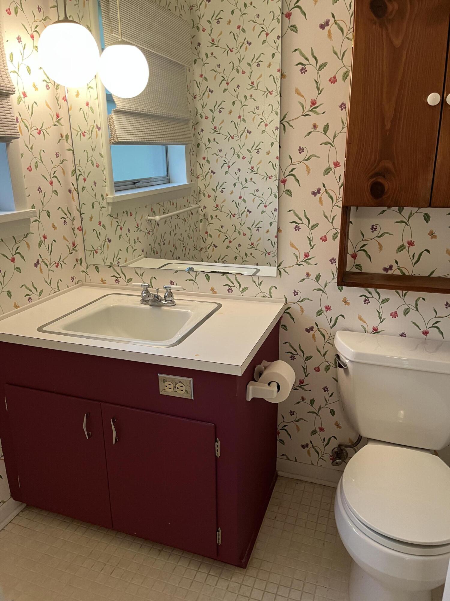 349 Powell Drive Crestview, FL 32536 - Photo 25 of 30 a bathroom with a sink and a toilet