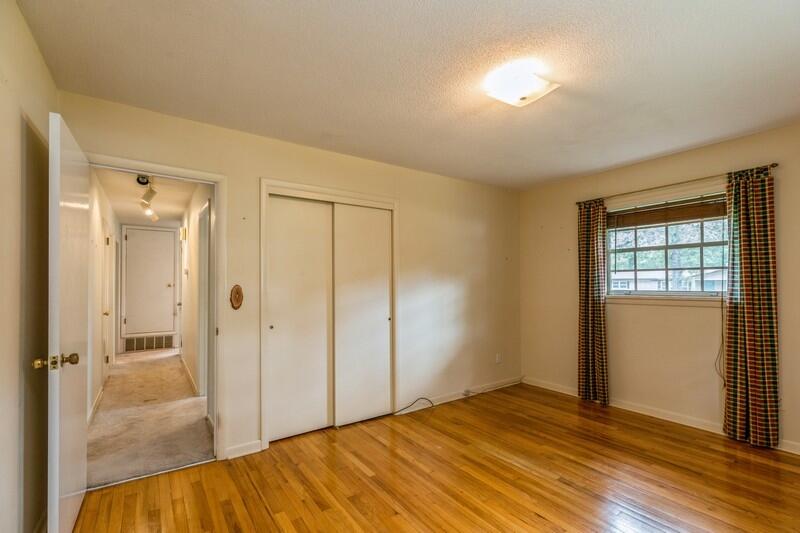 349 Powell Drive Crestview, FL 32536 - Photo 26 of 30 view of empty room with wooden floor and fan