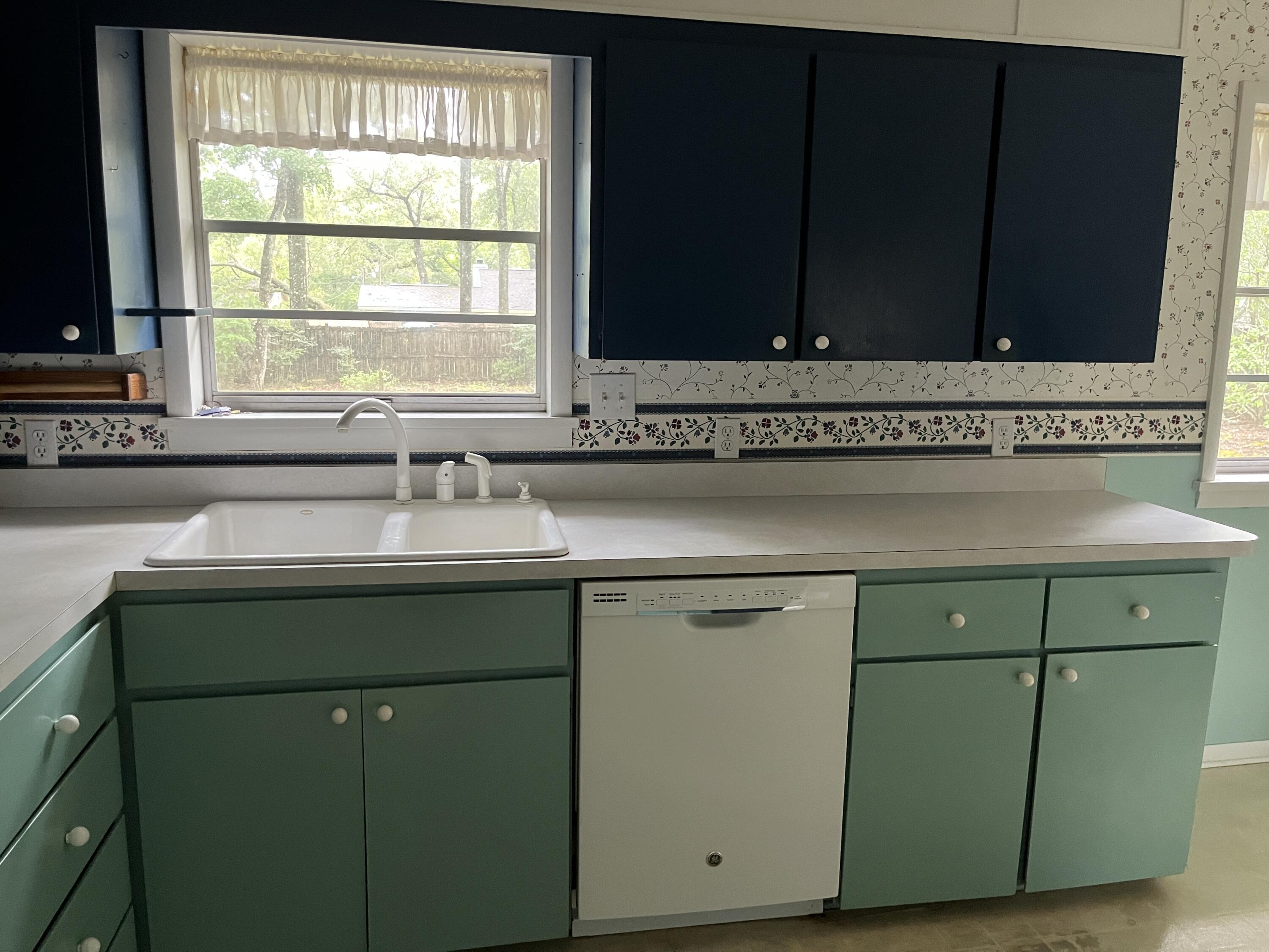 349 Powell Drive Crestview, FL 32536 - Photo 10 of 30 a sink a window and cabinets