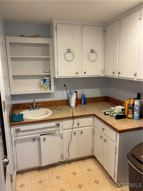 2695 Bethel Church Road Green Bay, VA 23942 - Photo 28 of 39 a kitchen with granite countertop a sink and cabinets