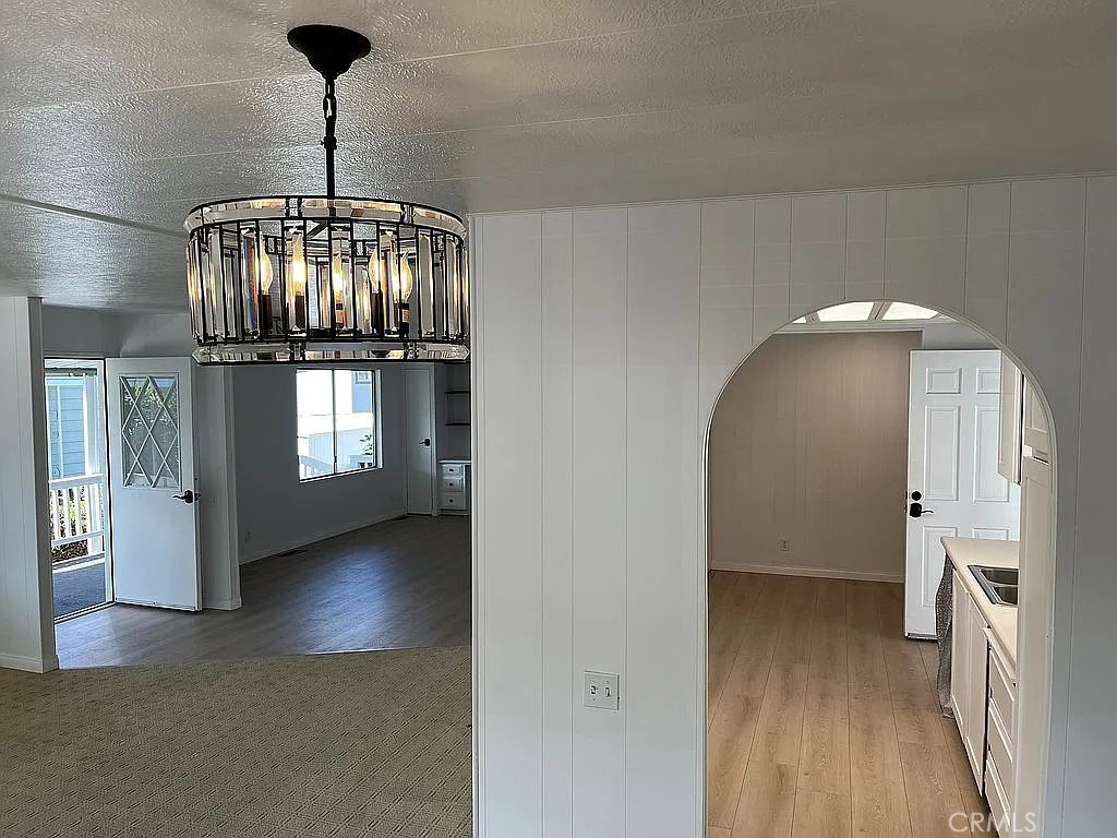14851 Jeffrey Road, Unit 135 Irvine, CA 92618 - Photo 11 of 17 a view interior of a house with chandelier