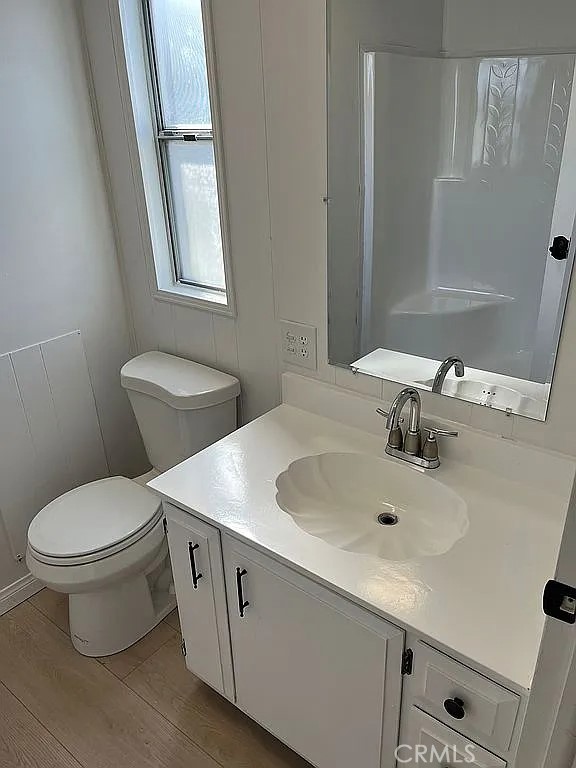14851 Jeffrey Road, Unit 135 Irvine, CA 92618 - Photo 13 of 17 a bathroom with a sink toilet and mirror