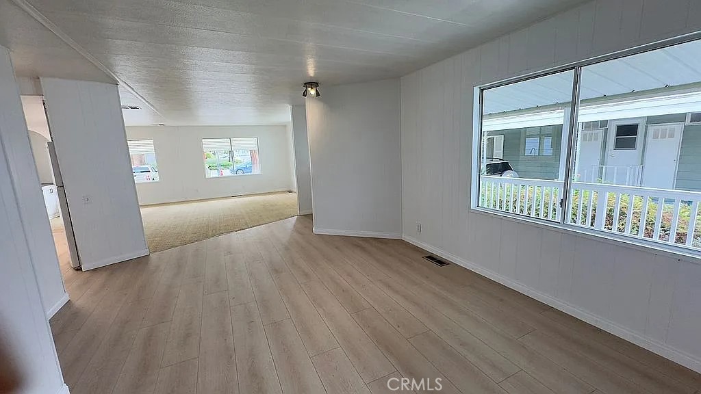 14851 Jeffrey Road, Unit 135 Irvine, CA 92618 - Photo 7 of 17 an empty room with windows