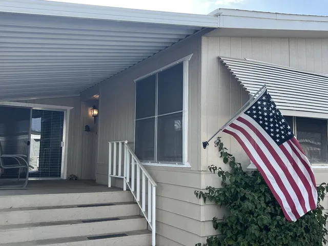 a view of wooden staircase and a hallway