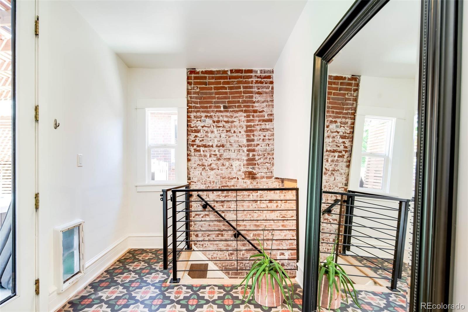 3751 Raleigh Street Denver, CO 80212 - Photo 16 of 36 a view of balcony with a floor to ceiling window
