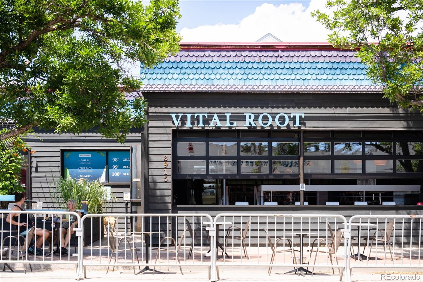 3751 Raleigh Street Denver, CO 80212 - Photo 31 of 36 a front view of a building with glass windows