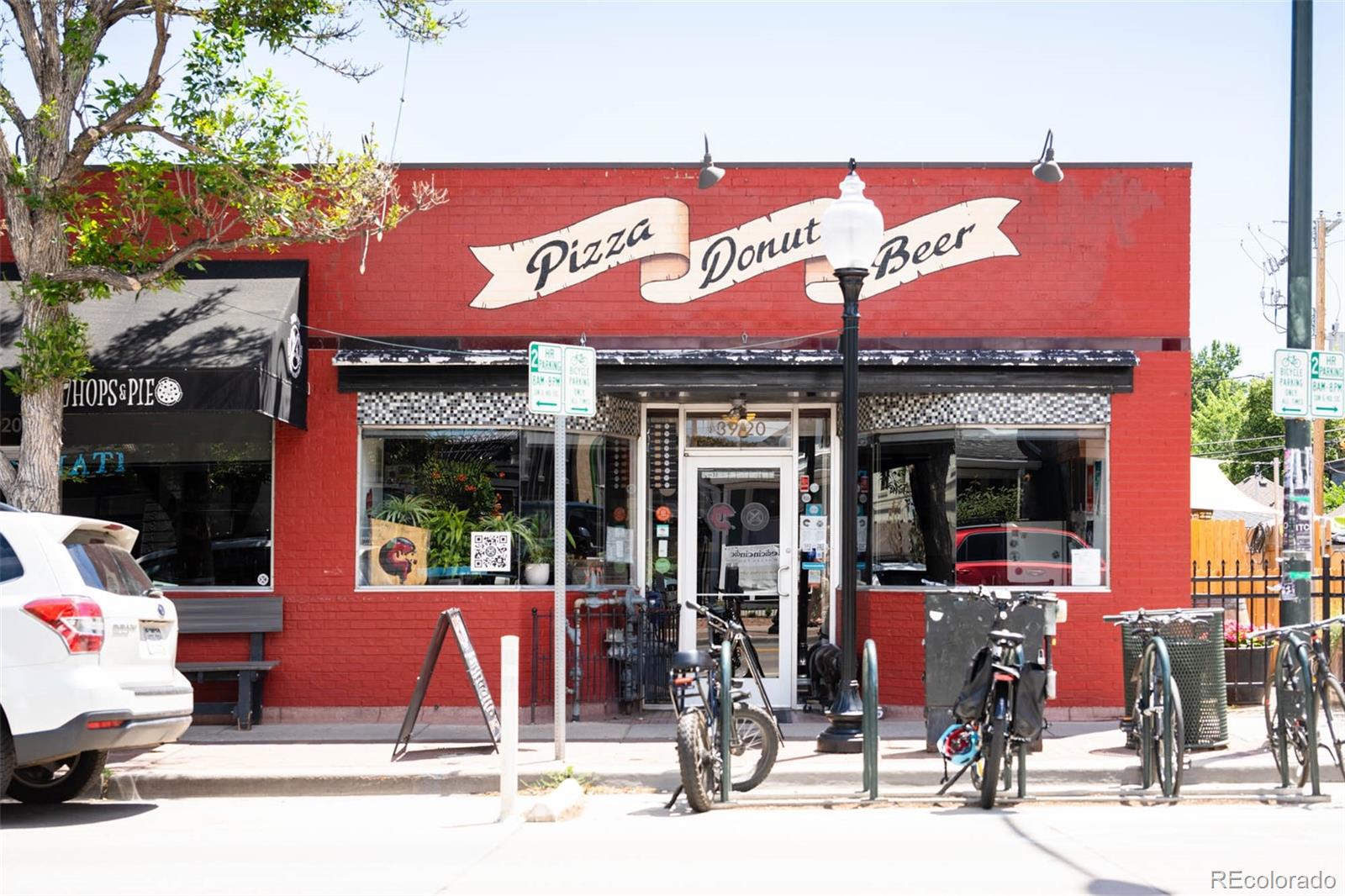 3751 Raleigh Street Denver, CO 80212 - Photo 33 of 36 a view of a cafe with sitting area