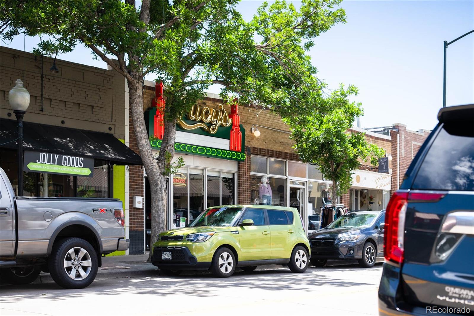 3751 Raleigh Street Denver, CO 80212 - Photo 36 of 36 a car parked in front of a building