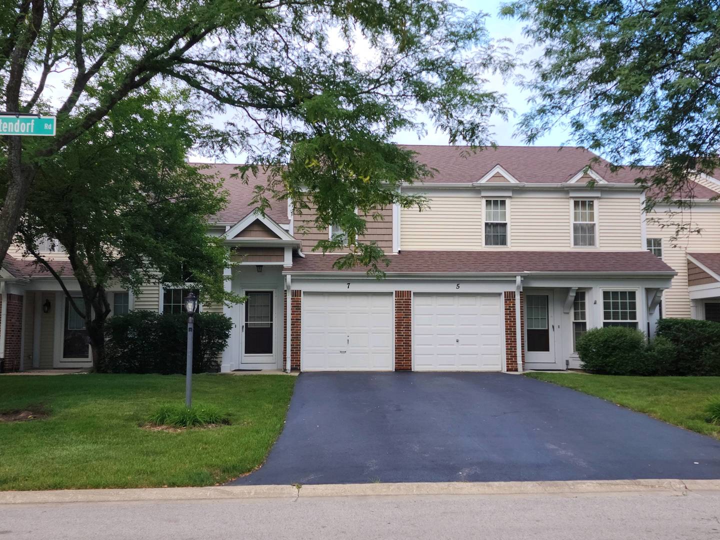 7 North Oltendorf Road Streamwood, IL 60107 - Photo 1 of 31 a front view of a house with a yard and garage