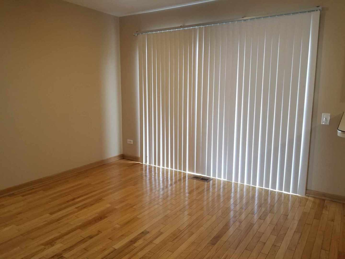 7 North Oltendorf Road Streamwood, IL 60107 - Photo 13 of 31 a view of wooden floor in a room