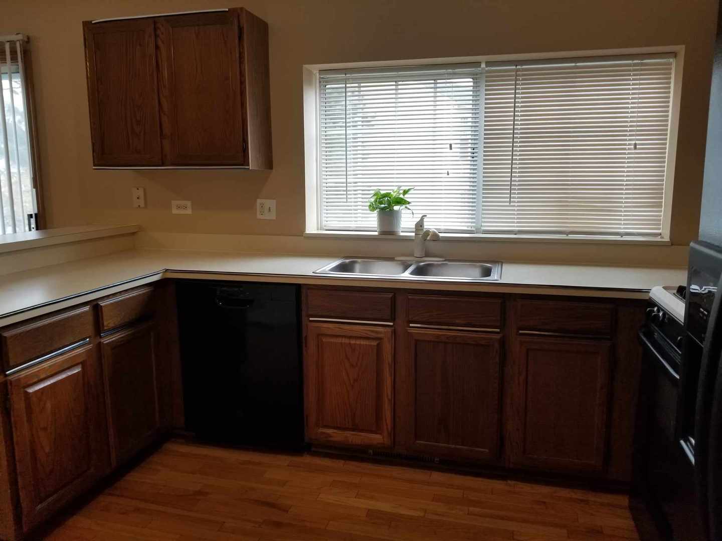 7 North Oltendorf Road Streamwood, IL 60107 - Photo 16 of 31 a kitchen with a sink and a window
