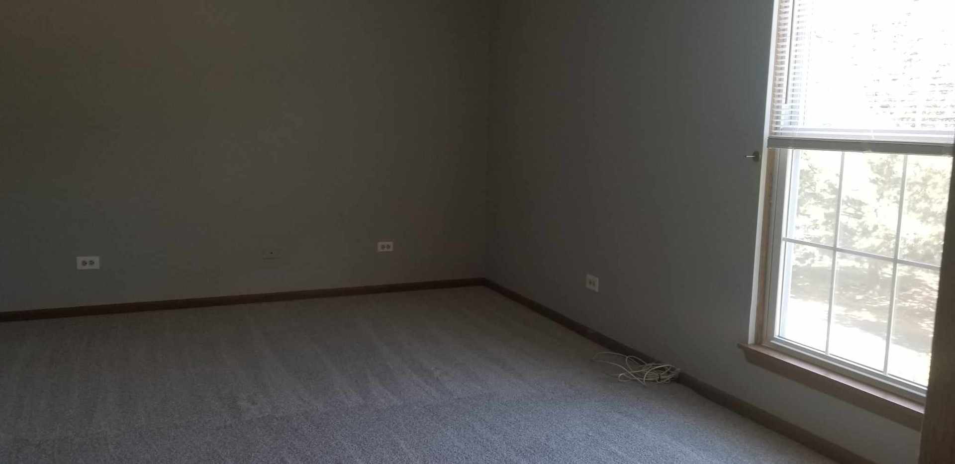 7 North Oltendorf Road Streamwood, IL 60107 - Photo 22 of 31 an empty room with a window