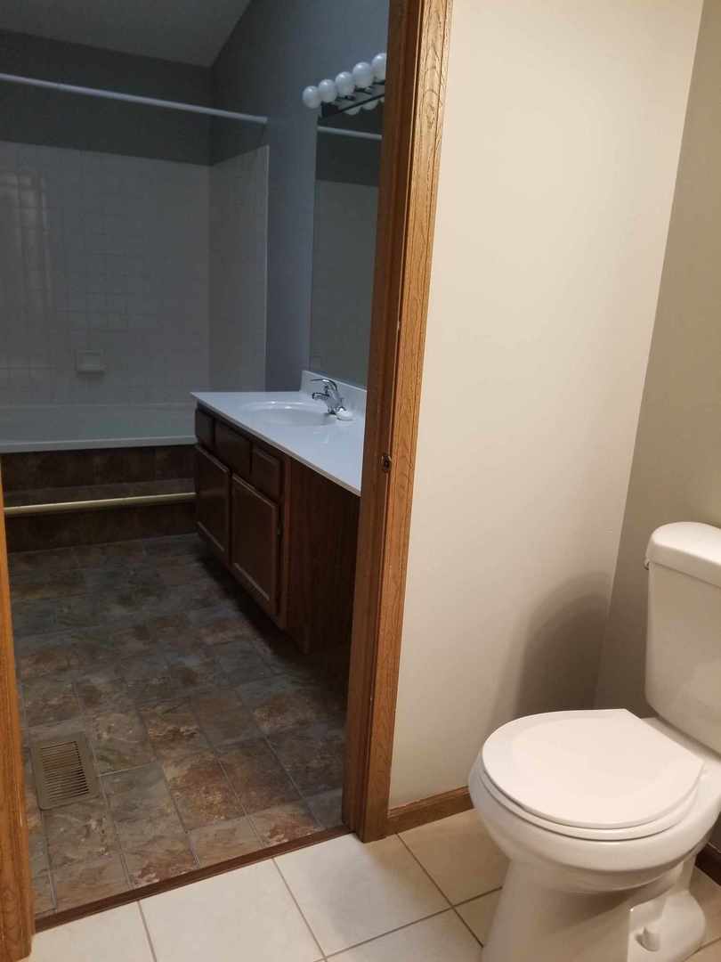 7 North Oltendorf Road Streamwood, IL 60107 - Photo 26 of 31 a bathroom with a sink and a toilet