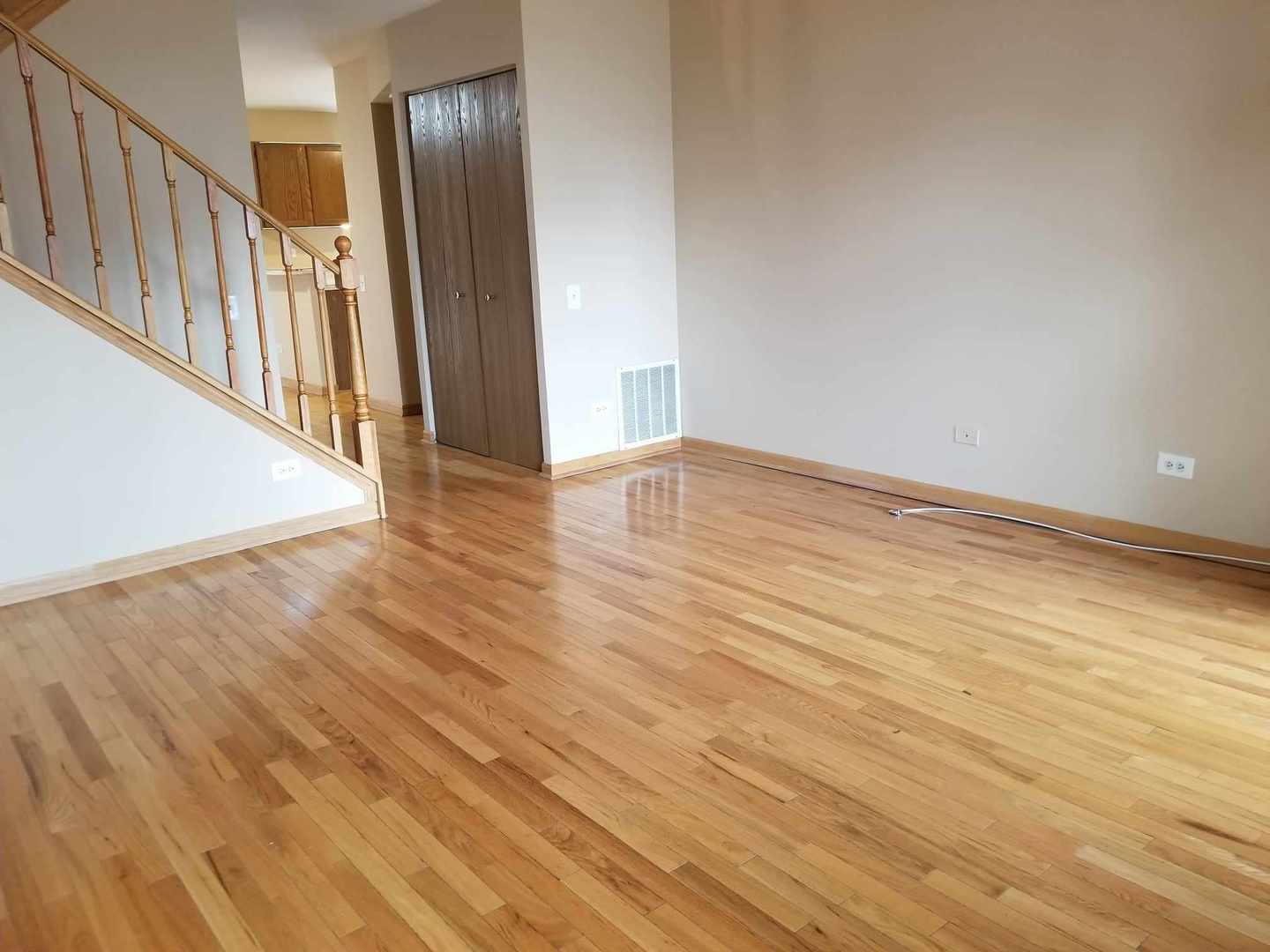 7 North Oltendorf Road Streamwood, IL 60107 - Photo 5 of 31 a view of an empty room with wooden floor