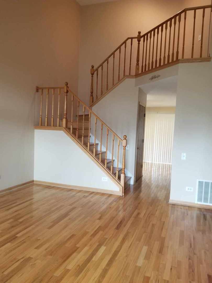 7 North Oltendorf Road Streamwood, IL 60107 - Photo 8 of 31 a view of entryway with wooden floor