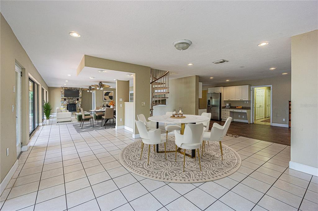 18129 Crawley Road Odessa, FL 33556 - Photo 32 of 46 a view of a dining room with furniture