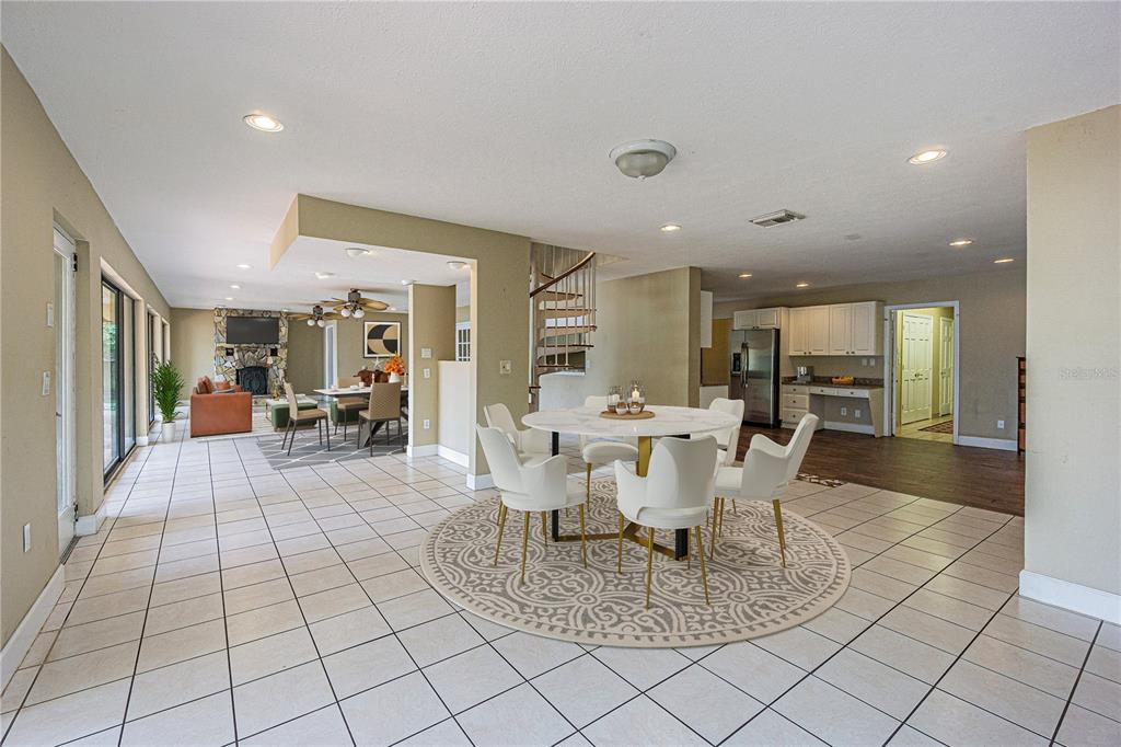 18129 Crawley Road Odessa, FL 33556 - Photo 36 of 46 a view of a dining room with furniture