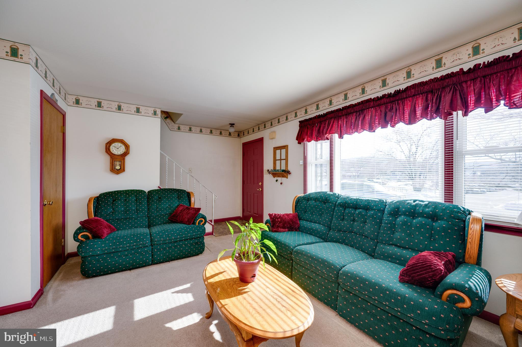 523 Mount Laurel Road Temple, PA 19560 - Photo 11 of 36 a living room with furniture and a large window