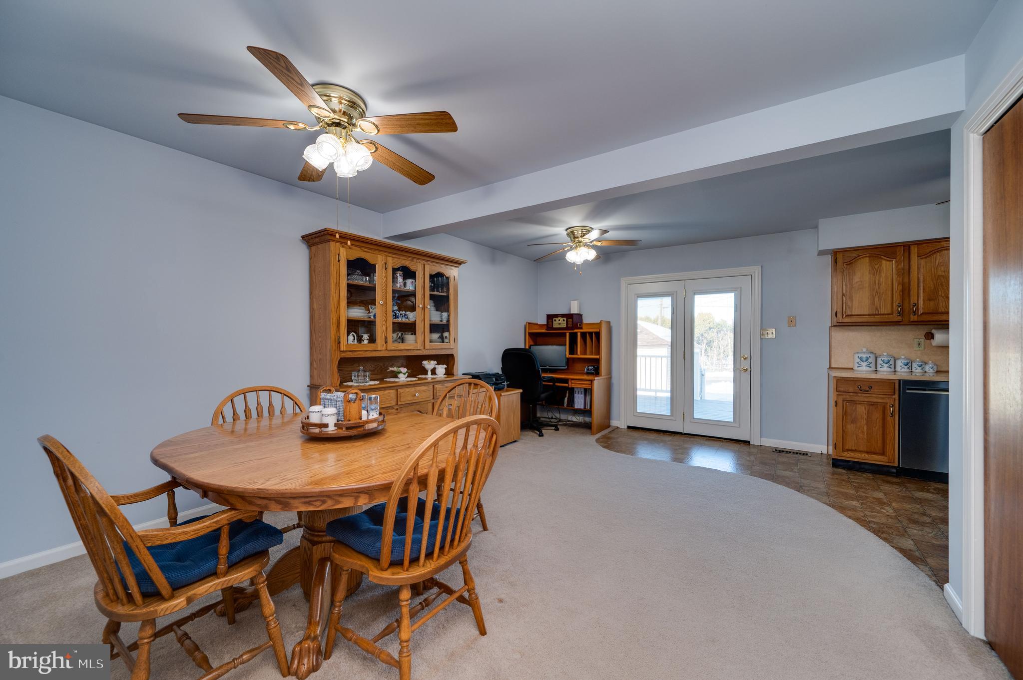 523 Mount Laurel Road Temple, PA 19560 - Photo 13 of 36 a view of a dining room with furniture and chandelier