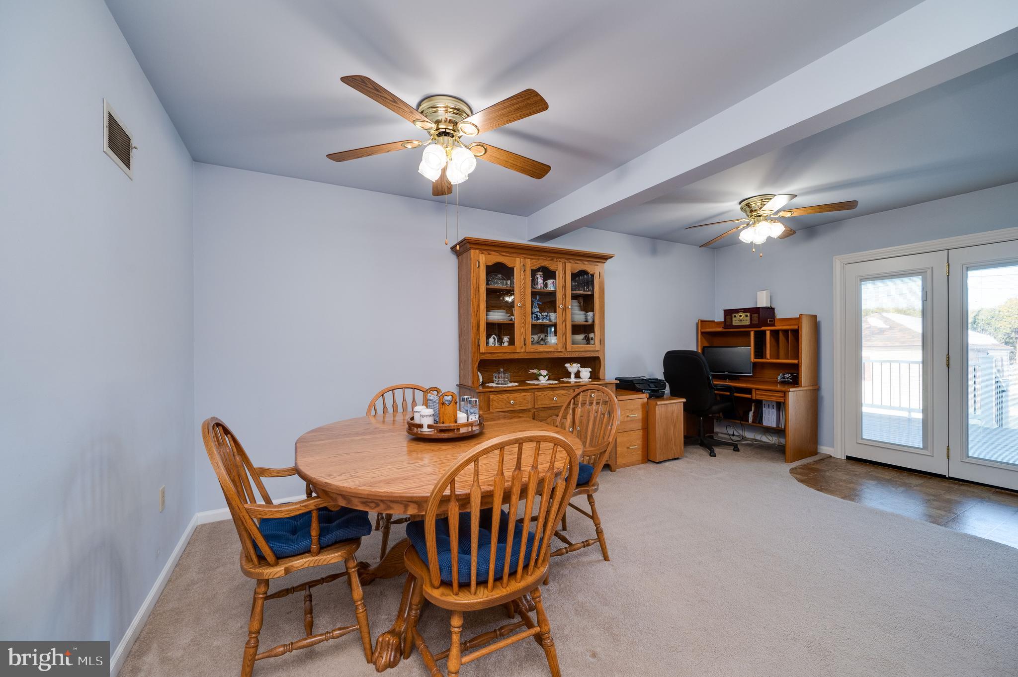 523 Mount Laurel Road Temple, PA 19560 - Photo 14 of 36 a view of a dining room with furniture and chandelier