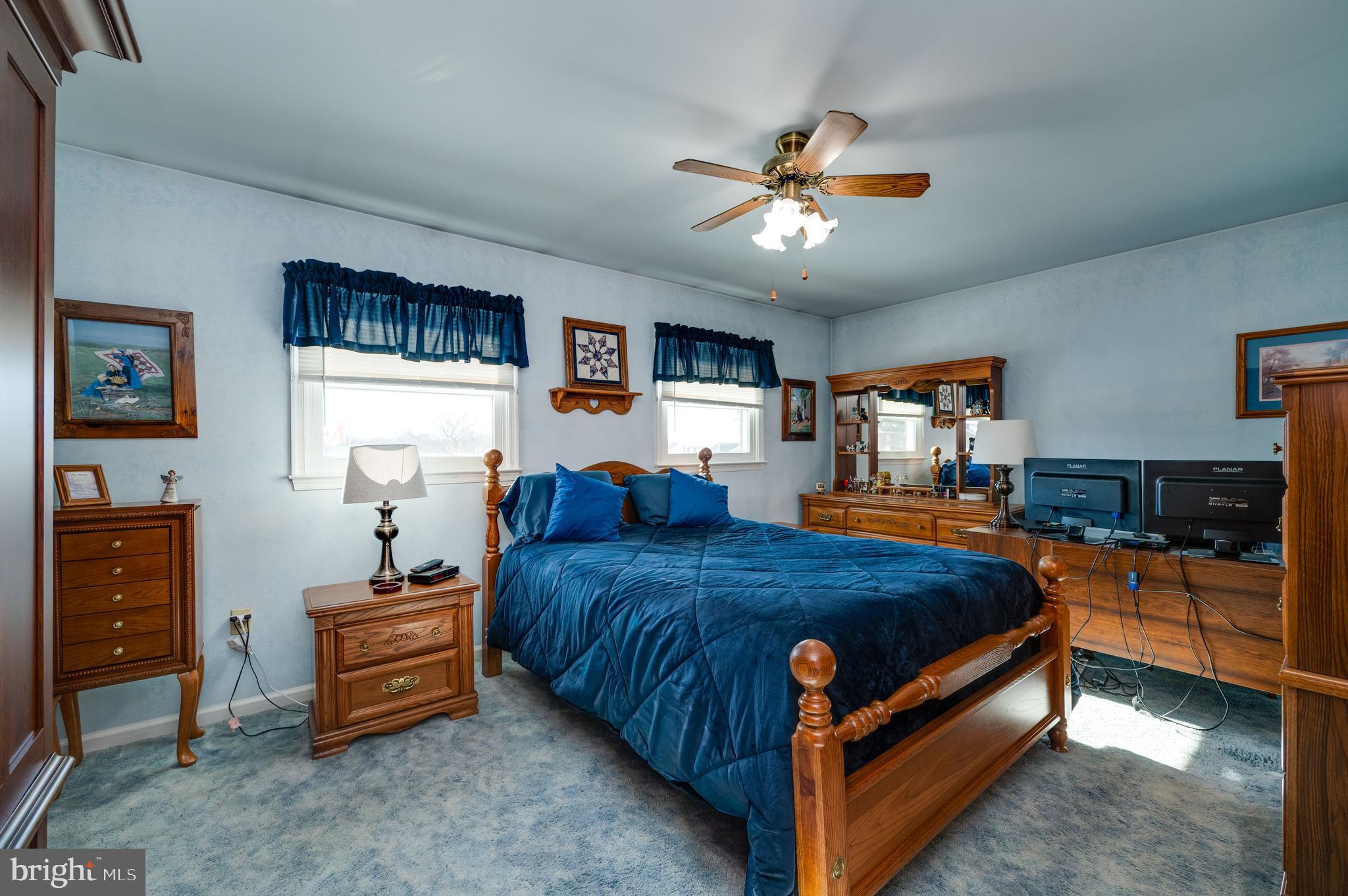 523 Mount Laurel Road Temple, PA 19560 - Photo 20 of 36 a bed room with a bed and a dresser