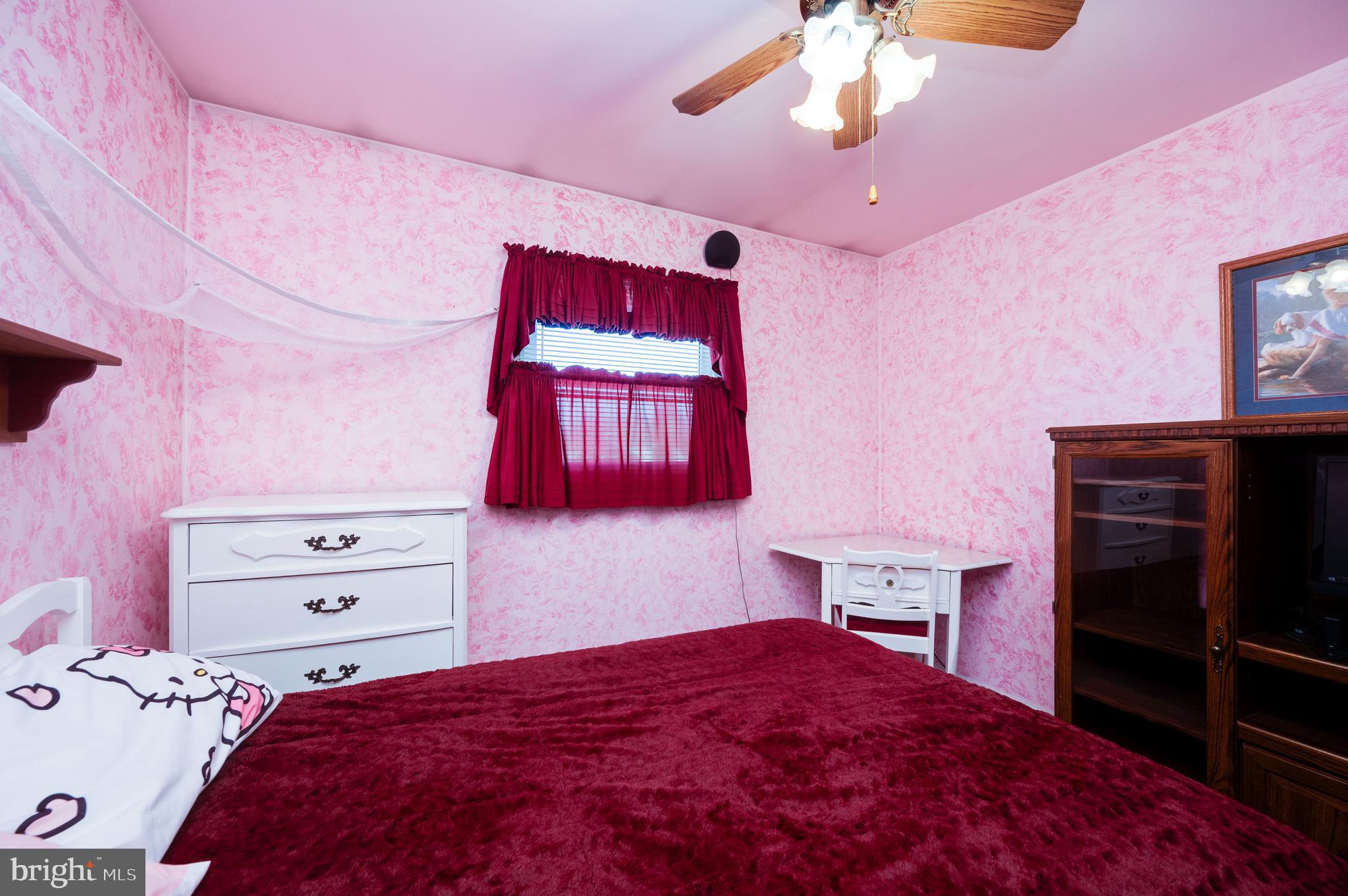 523 Mount Laurel Road Temple, PA 19560 - Photo 24 of 36 a bedroom with a bed and a dresser