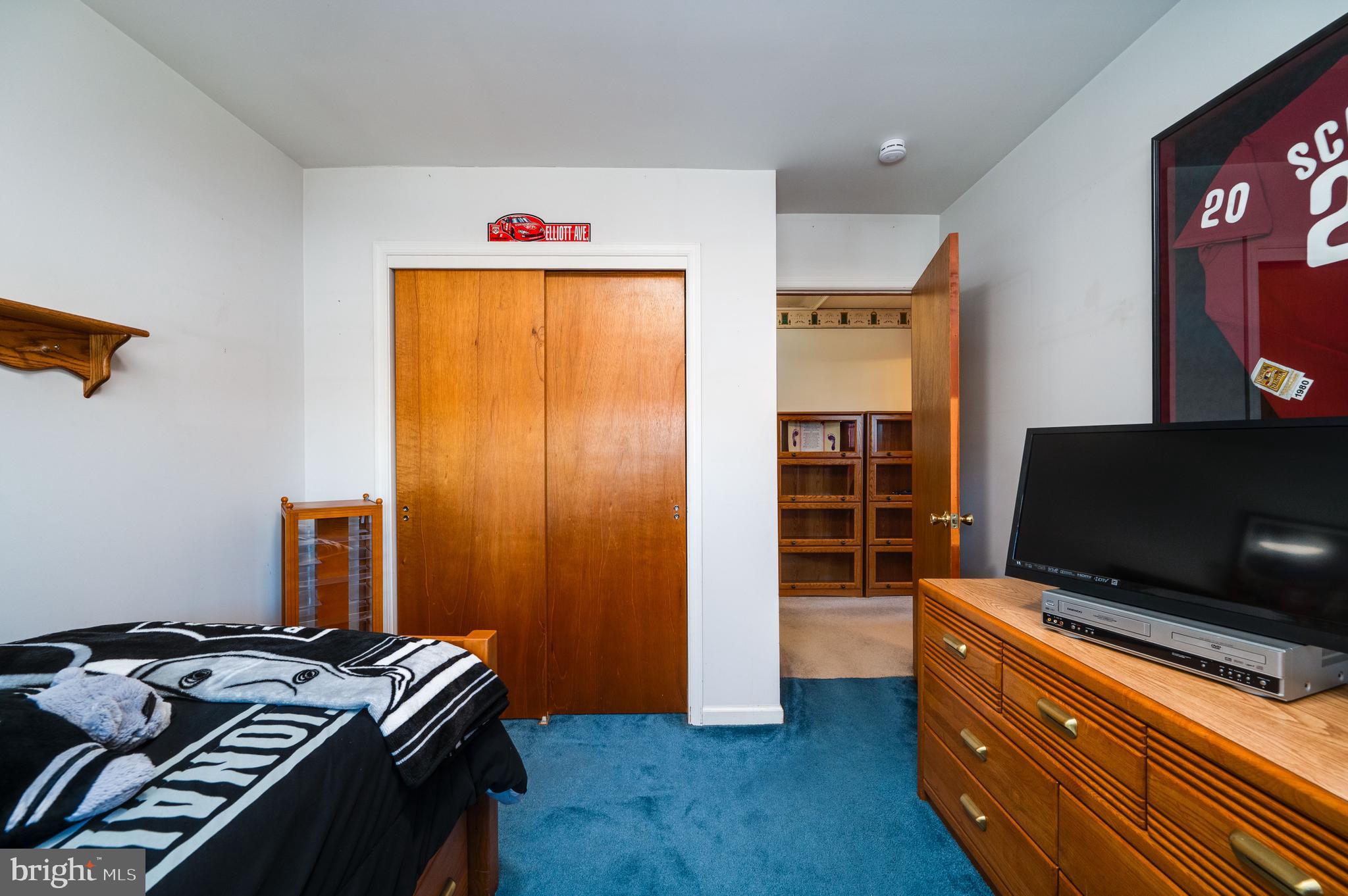 523 Mount Laurel Road Temple, PA 19560 - Photo 26 of 36 a room with furniture and a flat screen tv