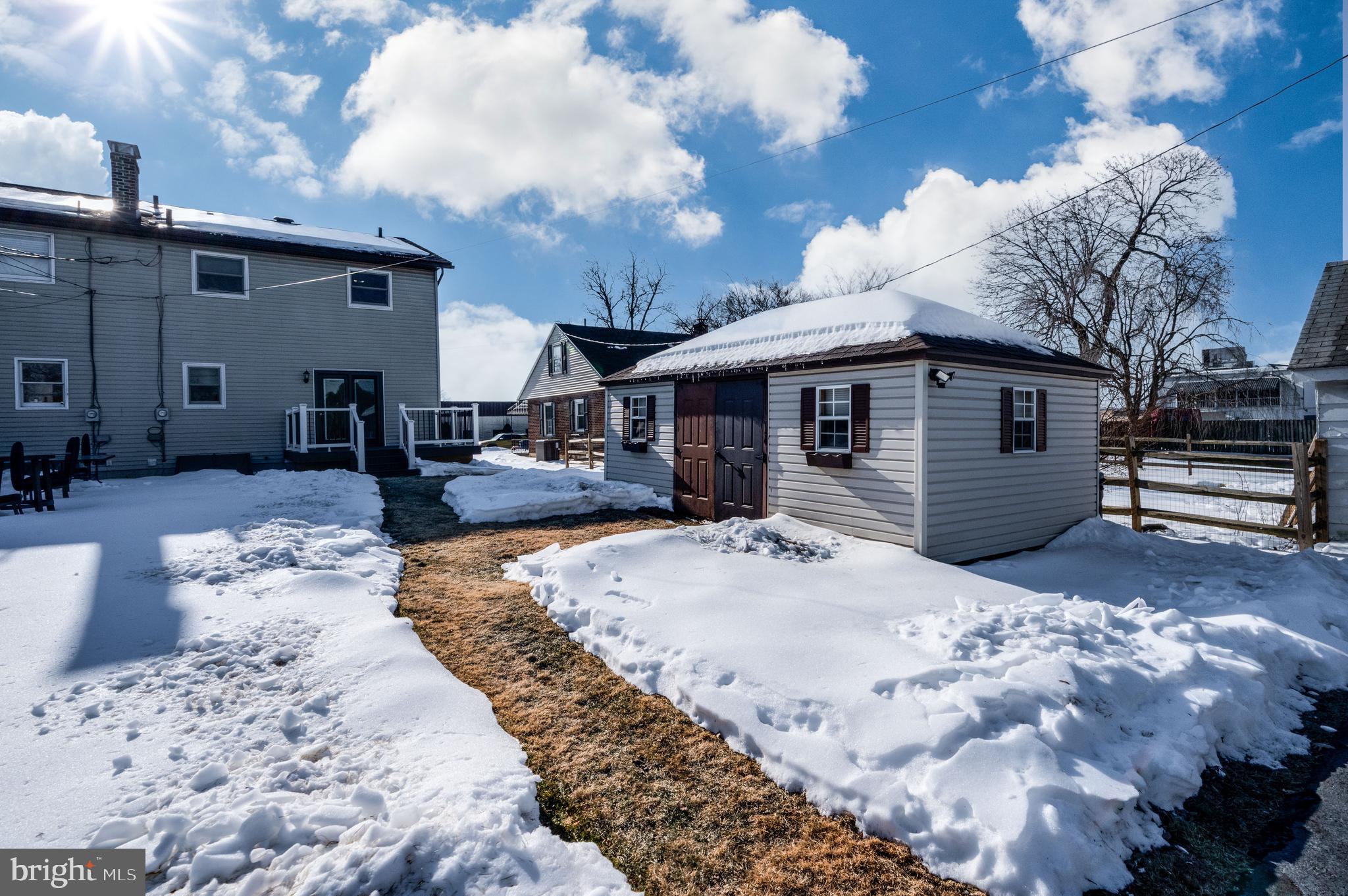523 Mount Laurel Road Temple, PA 19560 - Photo 30 of 36 a view of a house with a snow in the yard