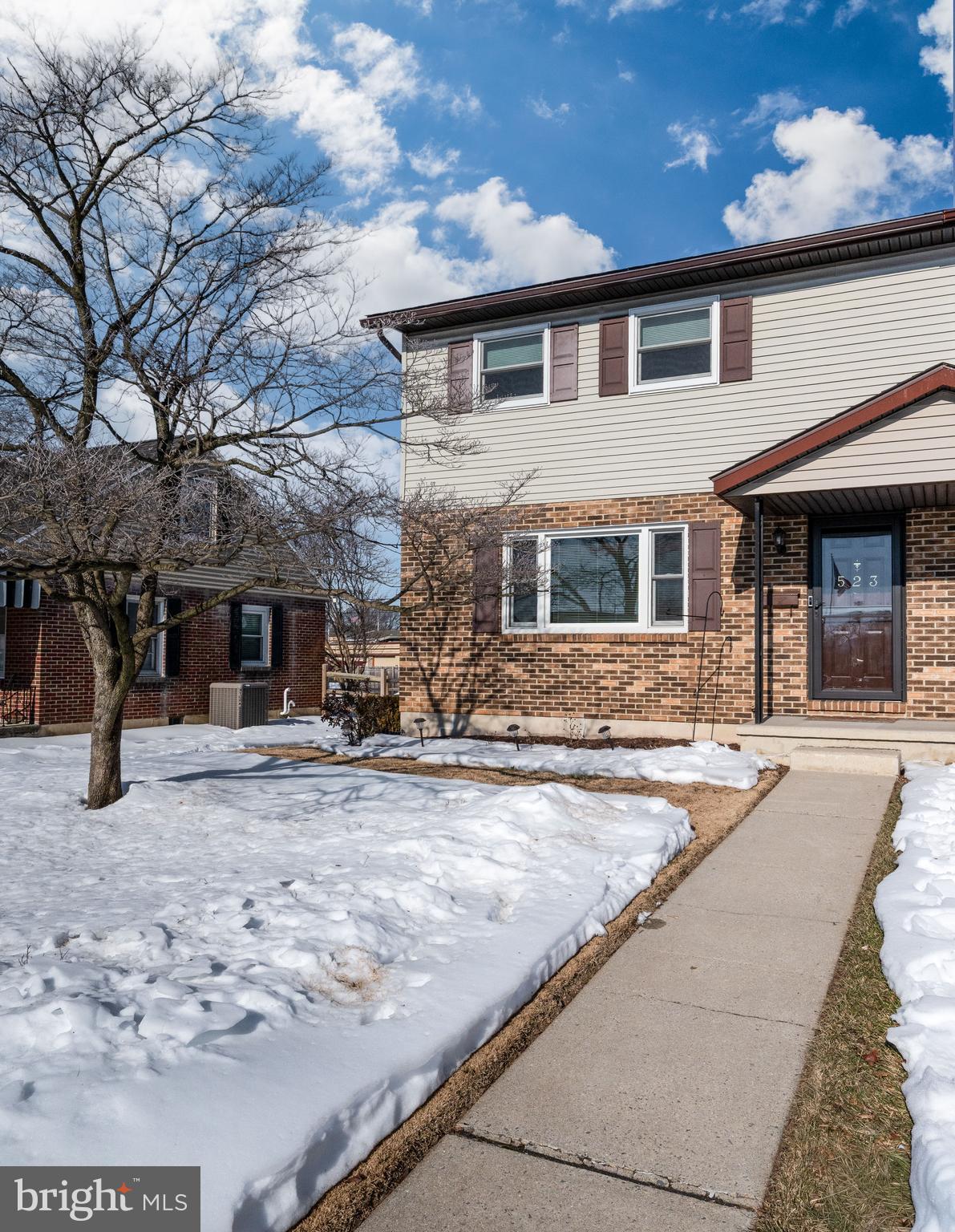 523 Mount Laurel Road Temple, PA 19560 - Photo 3 of 36 a front view of a house with garden
