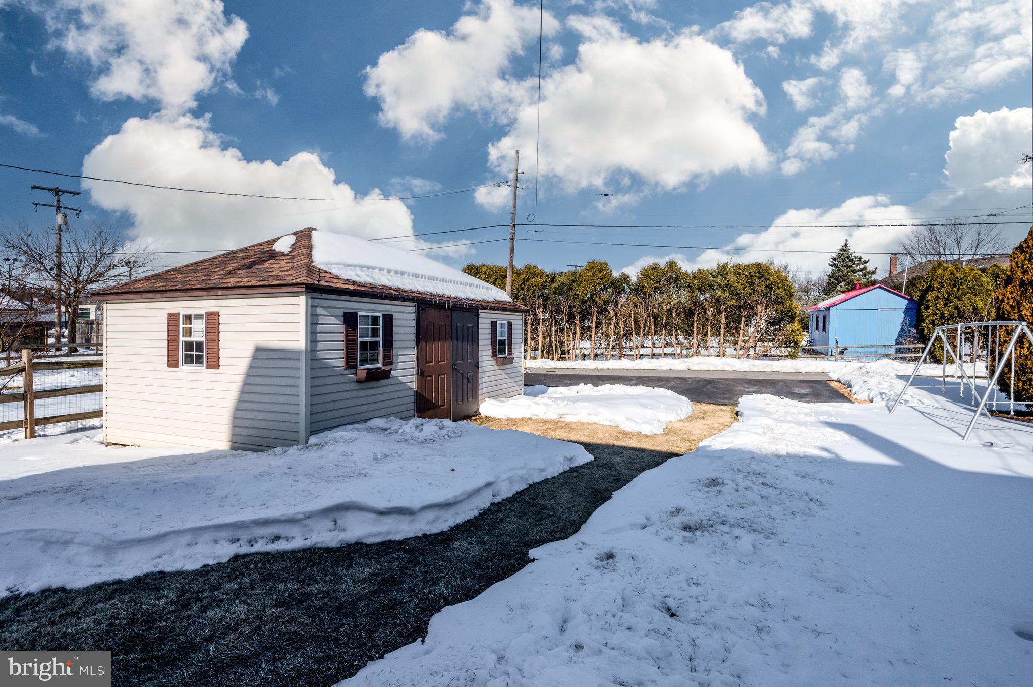 523 Mount Laurel Road Temple, PA 19560 - Photo 34 of 36 a view of a house with backyard and sitting area