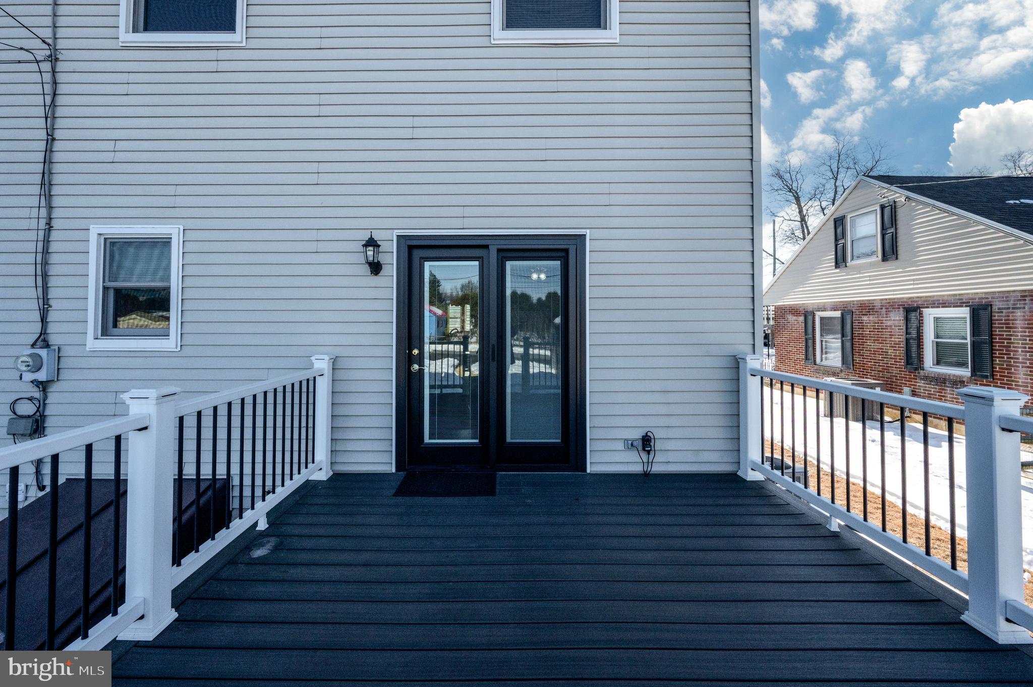 523 Mount Laurel Road Temple, PA 19560 - Photo 35 of 36 a view of a house with wooden deck