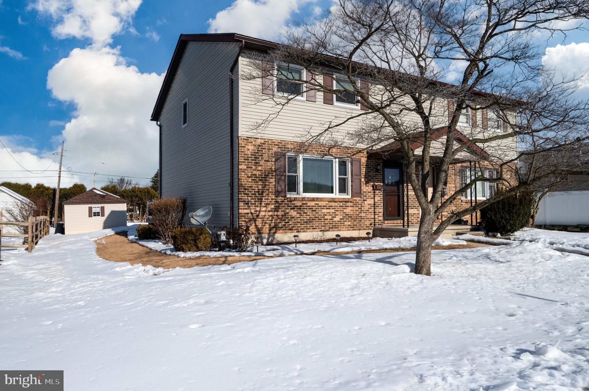 523 Mount Laurel Road Temple, PA 19560 - Photo 6 of 36 a view of a house with snow and trees