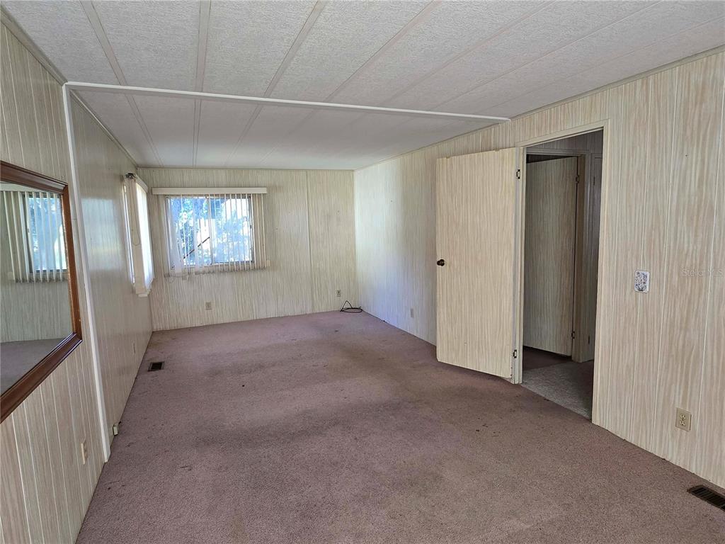 1991 Southeast 170th Avenue Road Silver Springs, FL 34488 - Photo 12 of 18 a view of empty room with windows