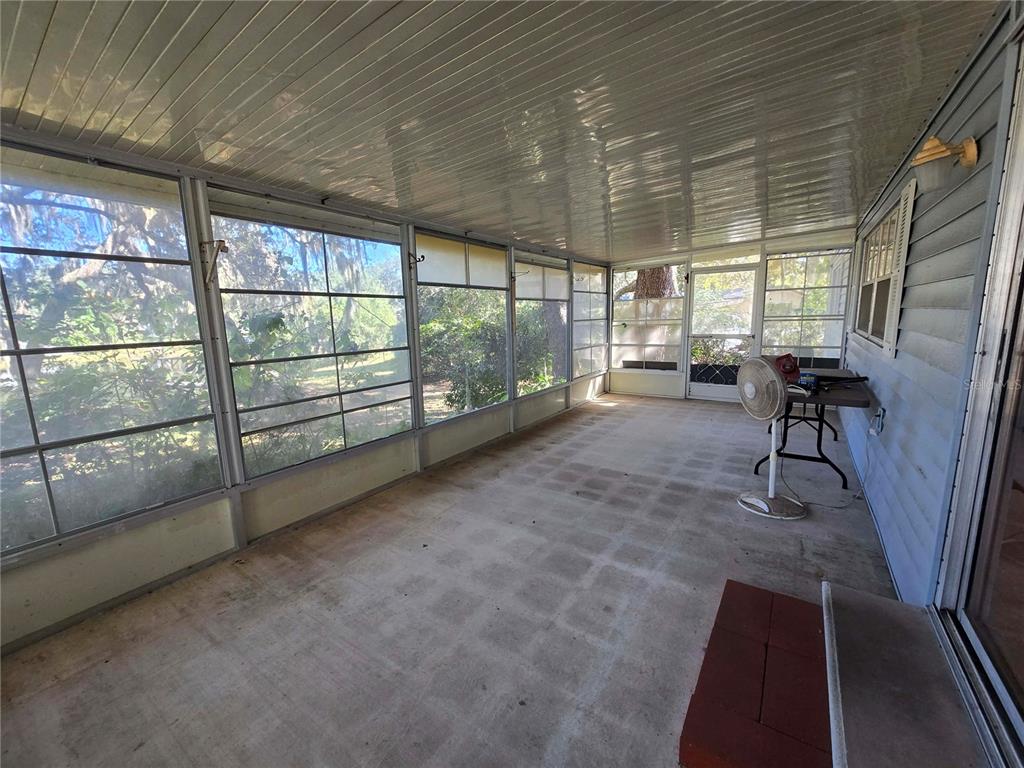 1991 Southeast 170th Avenue Road Silver Springs, FL 34488 - Photo 16 of 18 a view of a livingroom with furniture and a window