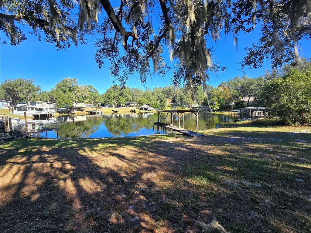 1991 Southeast 170th Avenue Road Silver Springs, FL 34488 - Photo 17 of 18 a view of a lake with houses