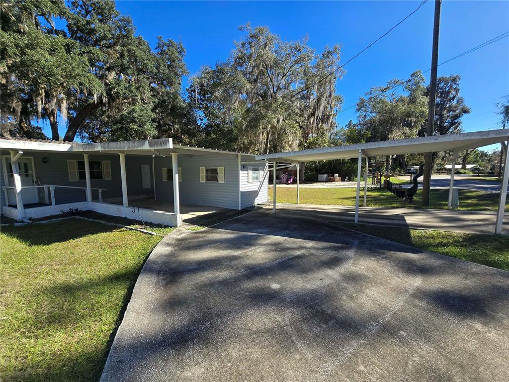 1991 Southeast 170th Avenue Road Silver Springs, FL 34488 - Photo 3 of 18 a view of a house with a yard