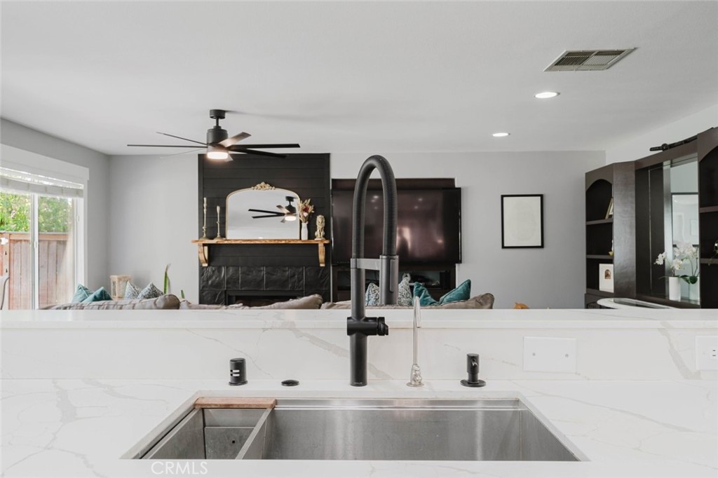 32480 The Old Road Castaic, CA 91384 - Photo 25 of 68 a bathroom with double vanity sink and a mirror