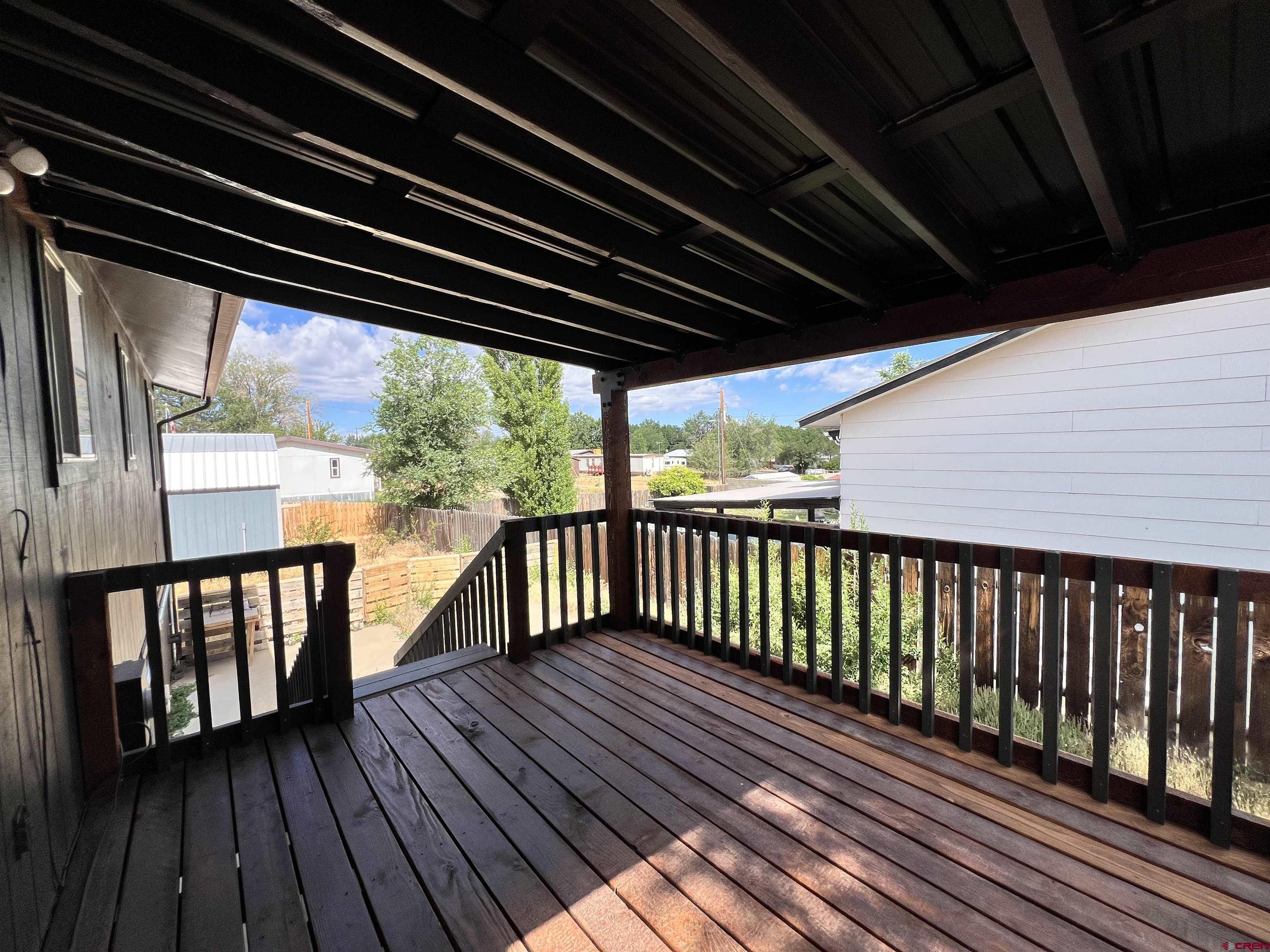 1328 Jackson Street Cortez, CO 81321 - Photo 10 of 37 a view of balcony with wooden floor
