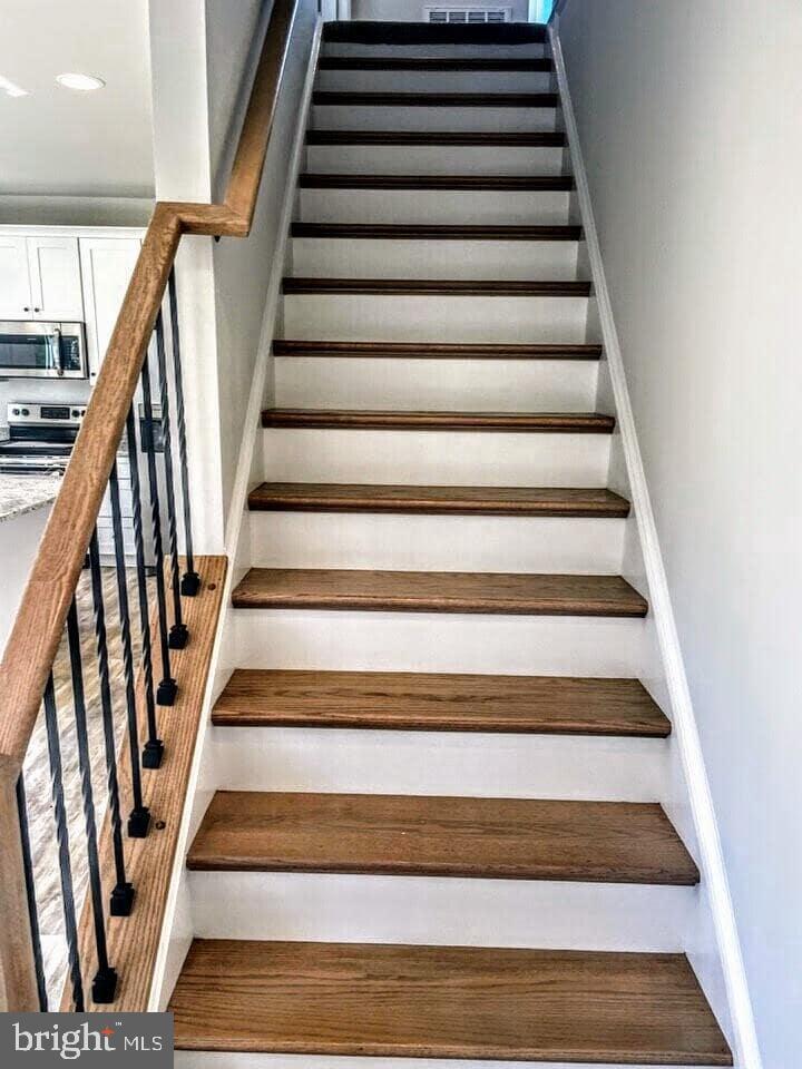 4230 Lakeview Parkway Locust Grove, VA 22508 - Photo 21 of 45 Hardwood oak stairs