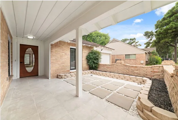 a view of a house with a patio